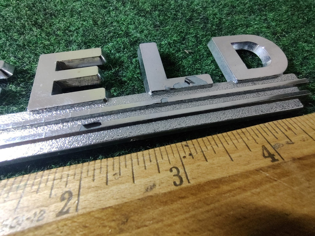 Feld Chevy Geo Kansas City KS Emblem Tag Frame Holder Logo Nameplate Name 5S5