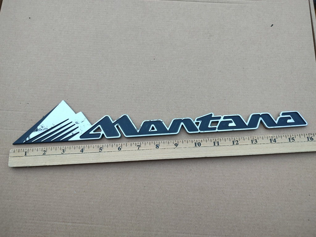 Pontiac 1999-2005 Montana Front Door Side Emblem badge Logo Name 10413185 MT1