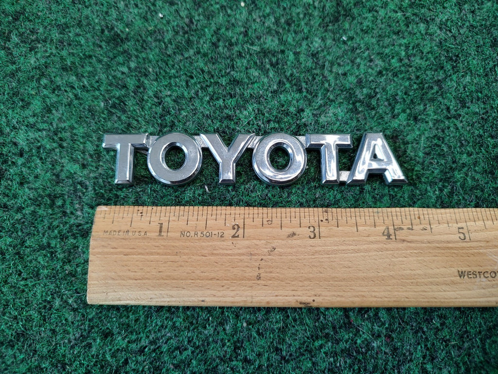 2003-2008 Toyota Matrix Liftgate Emblem Logo OEM 75441-02070 Trunk Rear 1S5