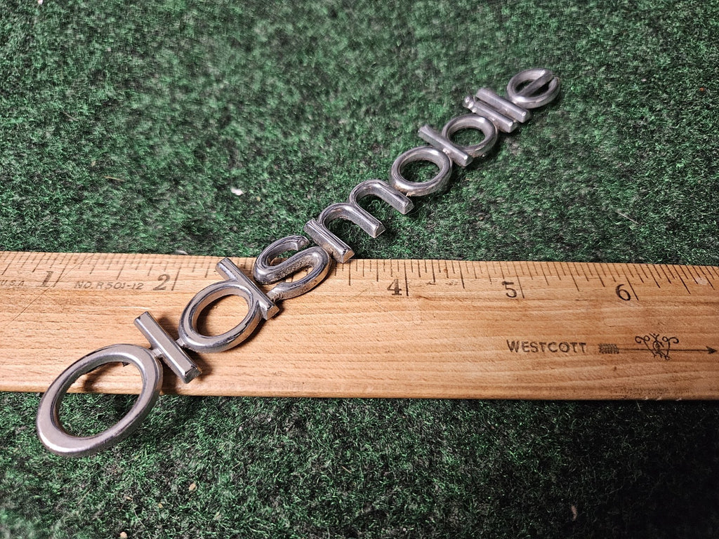 Oldsmobile OEM Chrome Emblem Badge Logo Nameplate Name Plate 6.25" 3M3