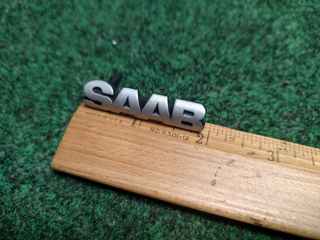 Genuine Saab Front Grille Emblem Name Plate OEM 900 NG Logo Badge 448127 1S1