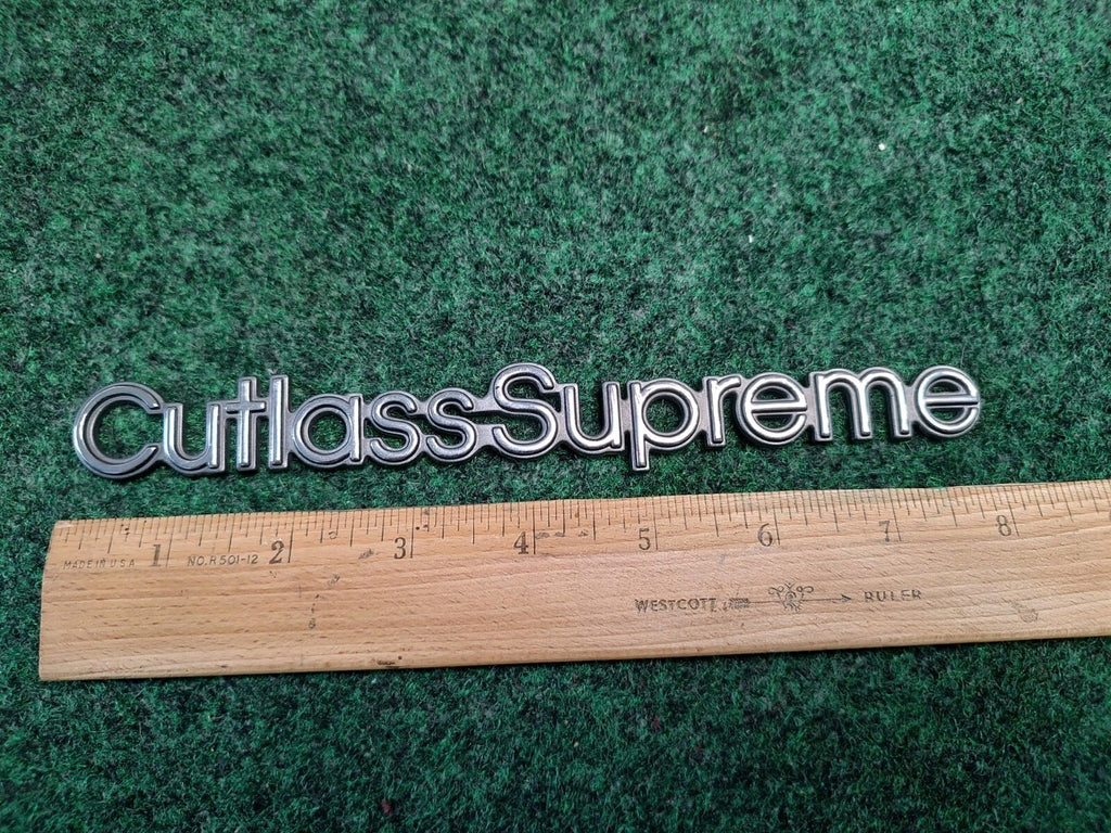 93 94 95 96 97 OLDSMOBILE CUTLASS SUPREME SIDE EMBLEM BADGE SYMBOL LOGO OEM 1S6