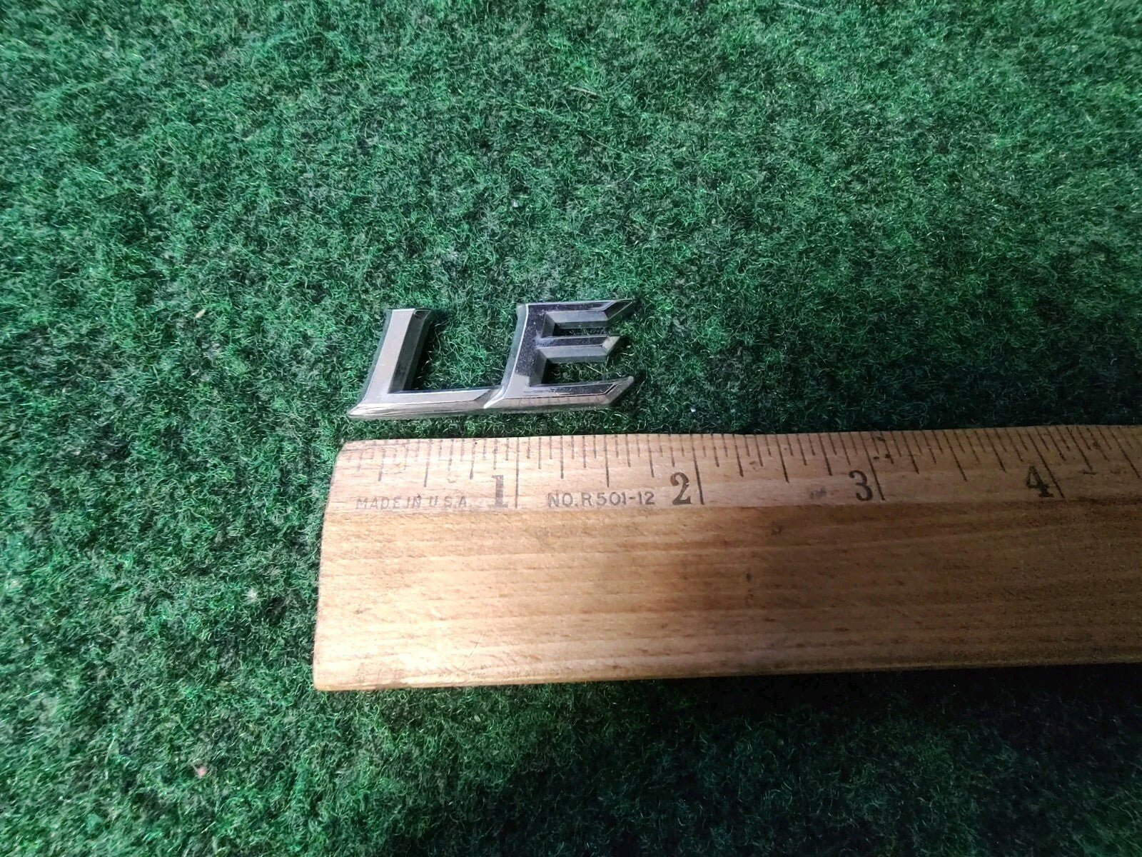 Genuine Toyota Camry "LE" Emblem USED 2002-2006  Rear 75443-AA100 8L2