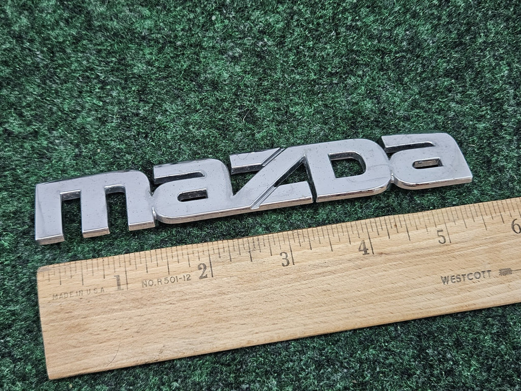 1999 00 2001 2002 2003 Mazda Protege Rear Trunk Nameplate Emblem B25D-51-710 GL1