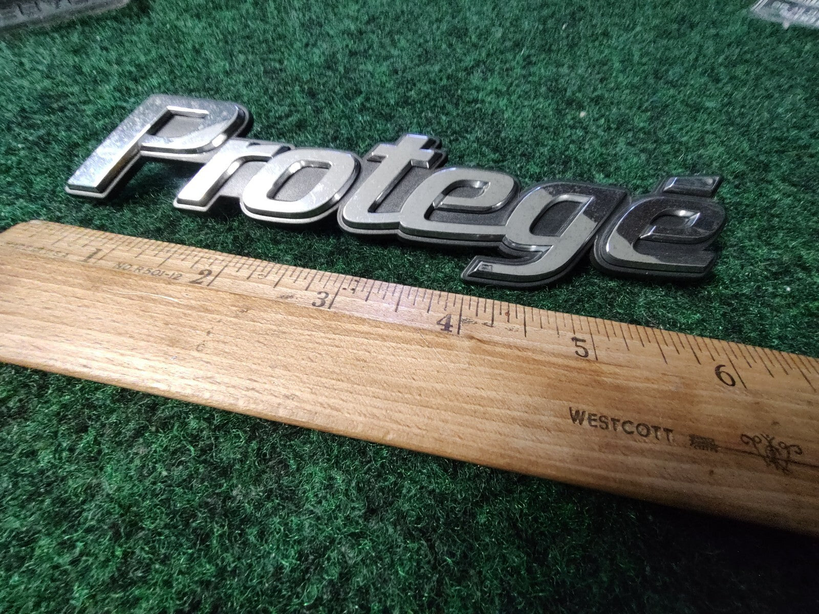 Mazda Protege trunk emblem badge decal logo symbol OEM Factory Genuine 3S1
