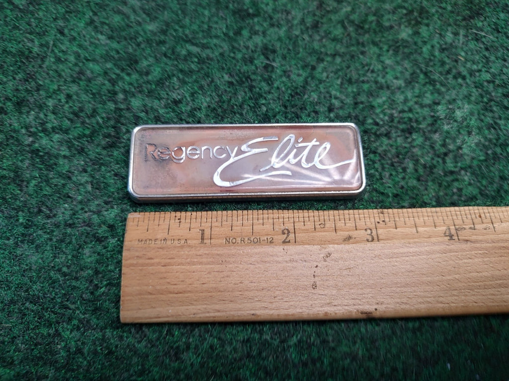 OLDSMOBILE REGENCY ELITE REAR EMBLEM LOGO BADGE SIGN SYMBOL OEM USED 3S5
