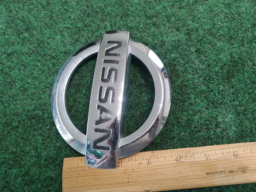 2004-2015 Armada NISSAN Logo Liftgate Emblem Chrome Finish 93491-7S000 OEM 2S8