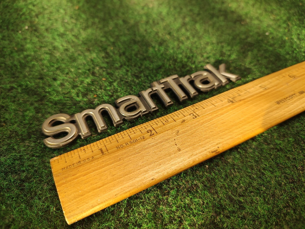 OLDSMOBILE SMART TRAK SMARTTRAK EMBLEM LOGO BADGE SYMBOL OEM USED 3S8