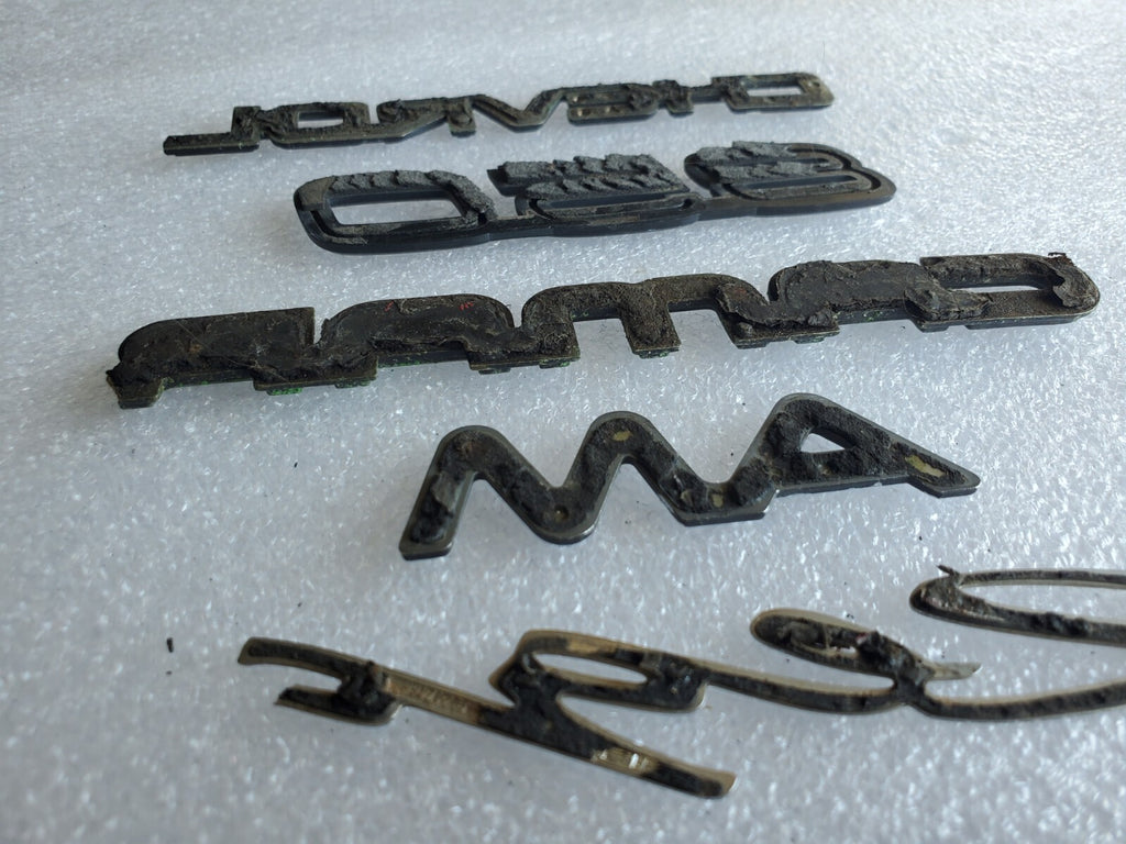 Misc Lot Of Emblwms Vintage Letters Logo OEM Mark VIII VOLVO Regal Camaro VNTG