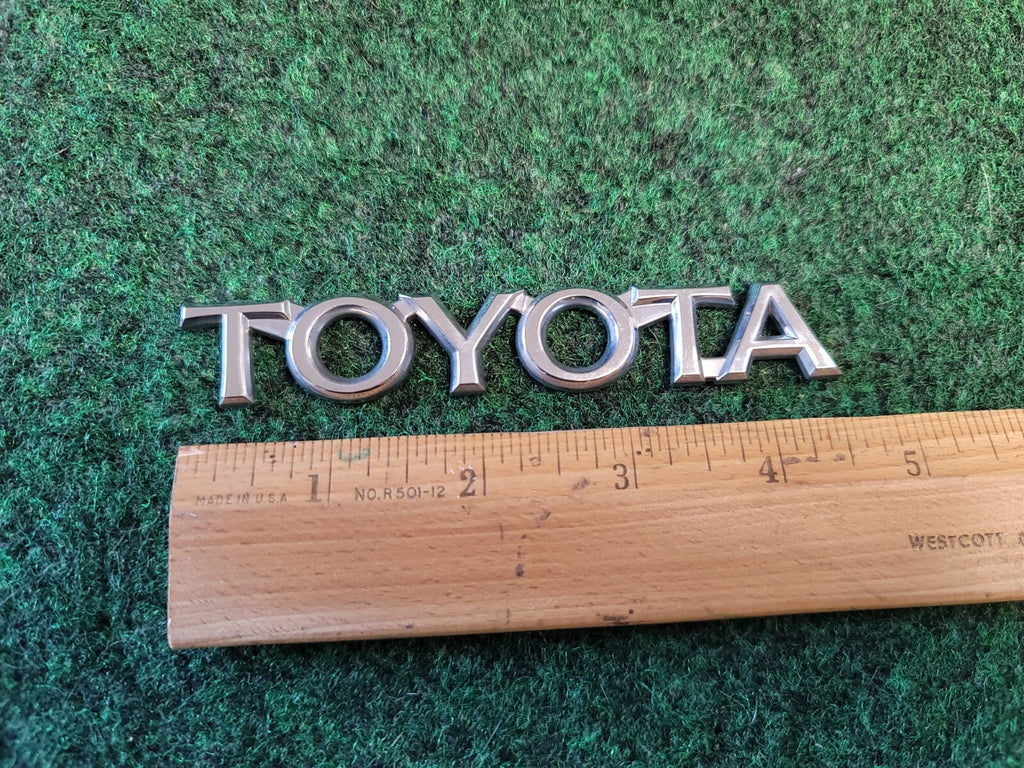 1997-2001 TOYOTA CAMRY REAR LID CHROME EMBLEM LOGO BADGE SYMBOL USED OEM 1M5