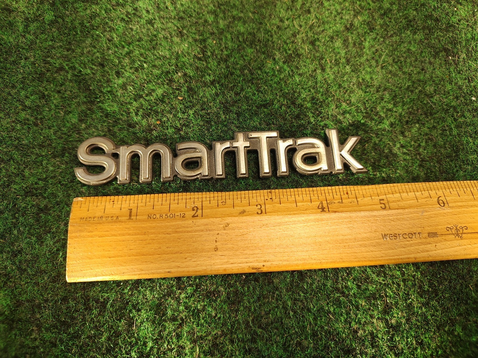 OLDSMOBILE SMART TRAK SMARTTRAK EMBLEM LOGO BADGE SYMBOL OEM USED 3S8