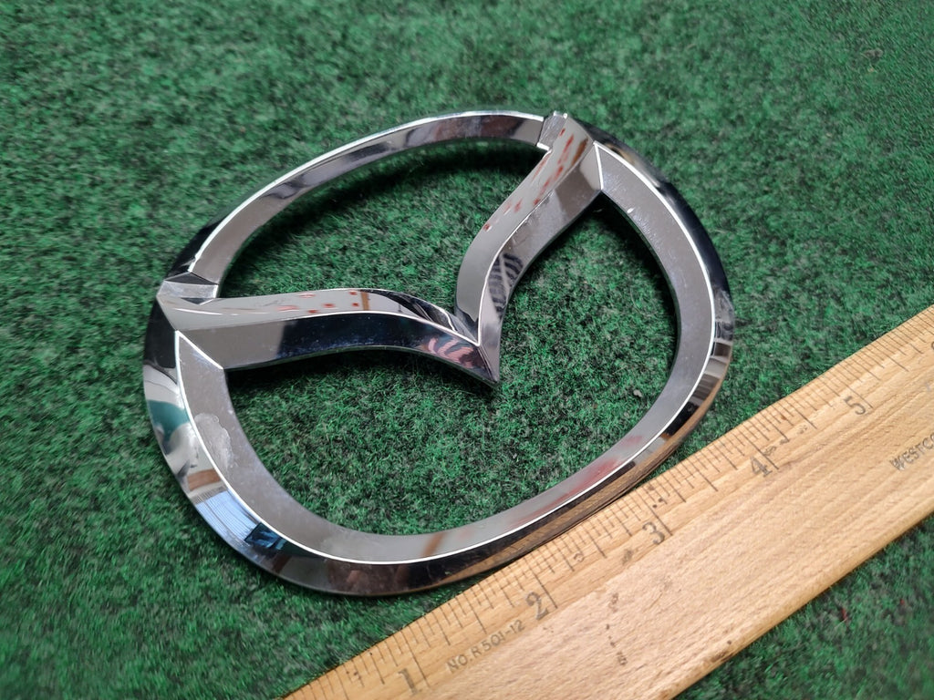 2004-2009 MAZDA 3 4DR SEDAN REAR TRUNK EMBLEM GENUINE NEW OEM BN8V-51-730A 1S1
