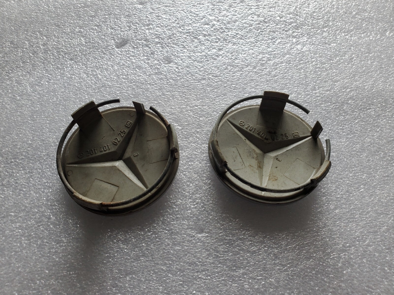 (2) Mercedes Benz OEM 1984-2016 Silver Center Cap Hub Cover 201 401 02 25 2L8