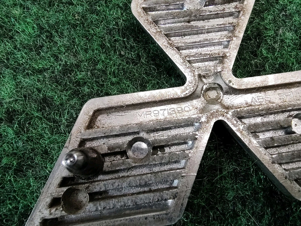 2002-2005 Mitsubishi Eclipse Rear Trunk Emblem Logo Nameplate MR971390 OEM 1S5