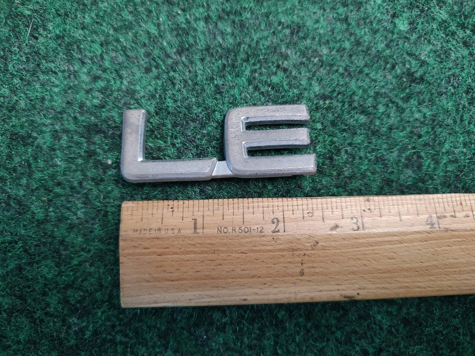 Toyota OEM LE Chrome Emblem Badge Logo Nameplate Name Plate 2S2