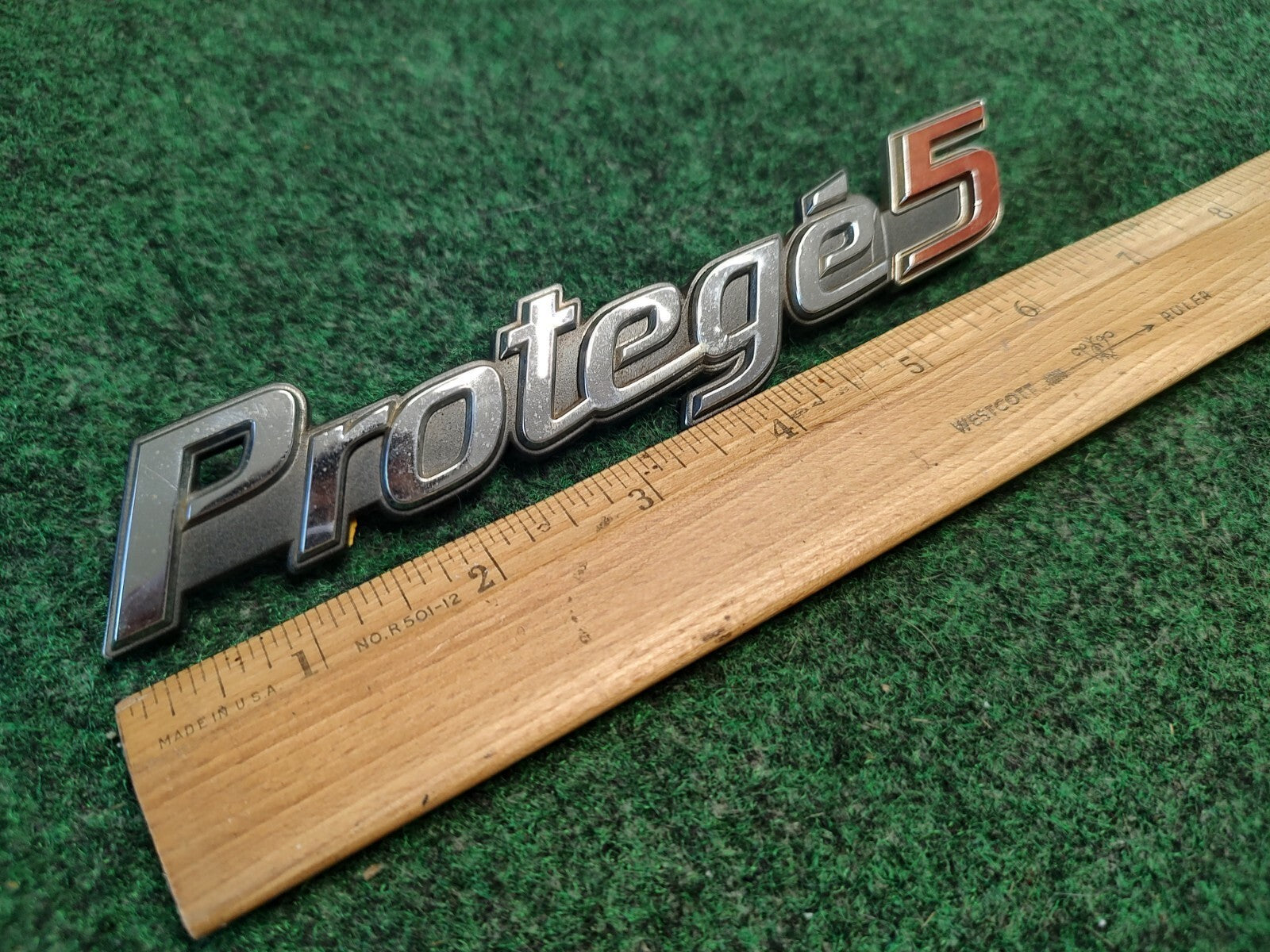 99 00 01 02 03 MAZDA PROTEGE 5 REAR CHROME EMBLEM LOGO BADGE SYMBOL USED OEM 4S4