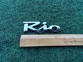 Kia OEM 2000-2005 Rio Chrome Rear Gate Emblem Badge Logo Nameplate Name 10L4